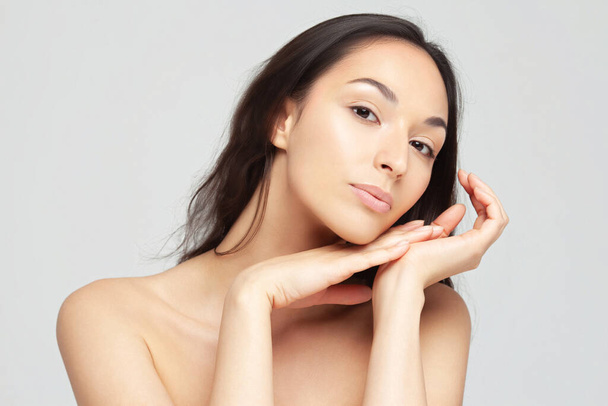 Portrait of young beautiful woman with clean perfect skin. Beauty and skin care - Foto, immagini