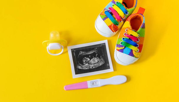 Ultrasound picture of a baby's photograph and accessories. Selective focus. child. - 写真・画像