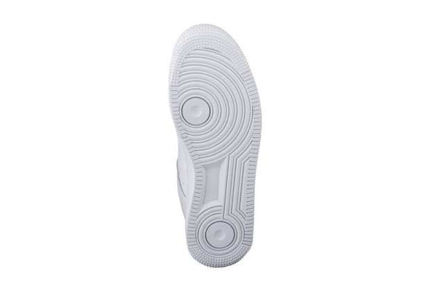 White sole of shoes. Bottom of sneakers on a white background is insulated. - Photo, Image