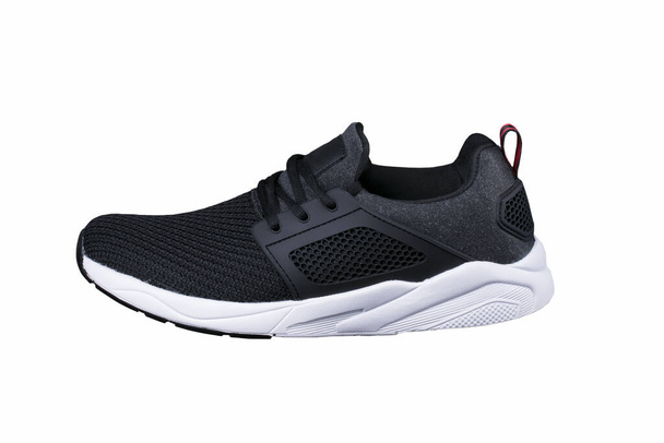 Sport shoes. Black sneaker made of fabric. - Photo, Image