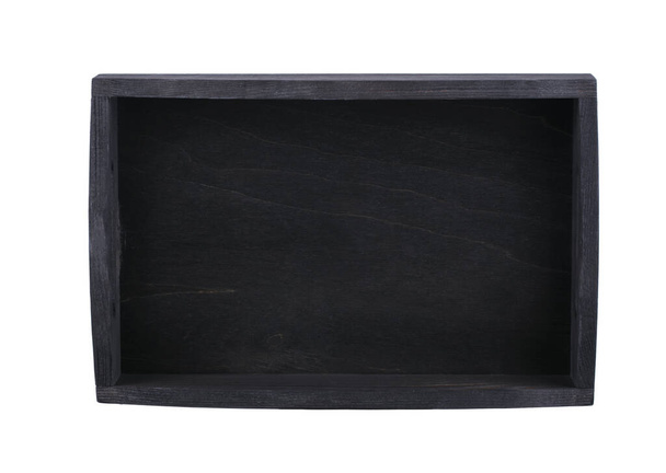 Boîte en bois noir vue sur le dessus sur un fond blanc. Plateau. - Photo, image