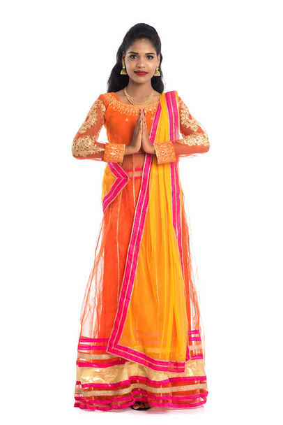 Beautiful Indian girl with welcome expression (inviting), greeting Namaste - Valokuva, kuva