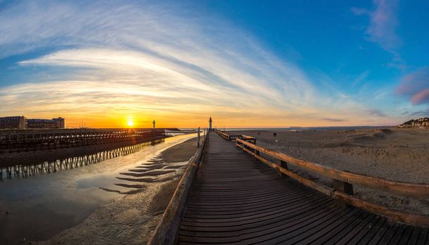 Panorama of Wooden Pier and Lighthouse in Trouville and Deauville in a beautiful summer evening, France - Photo, Image