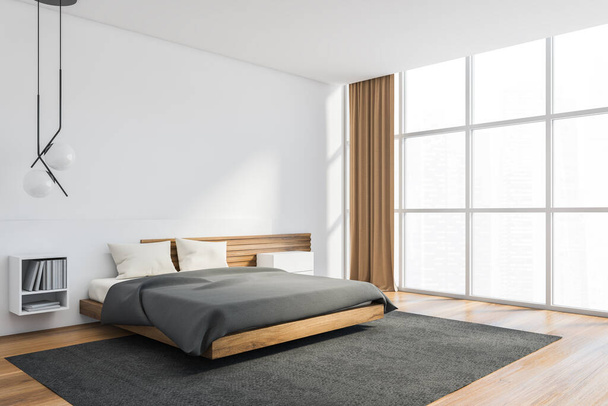 Corner of modern Scandinavian style bedroom with white and wooden walls, comfortable king size bed, panoramic window and bookshelf. Blurry citiscape. 3d rendering - Photo, image