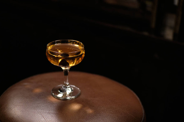 manhattan cocktail in bar with brack cherry - Fotoğraf, Görsel