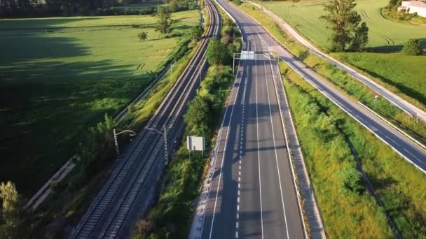 Aerial view, railway and road in rural landscape. - Footage, Video