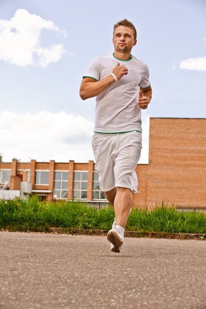 Portrait of sportsman runs - Fotó, kép