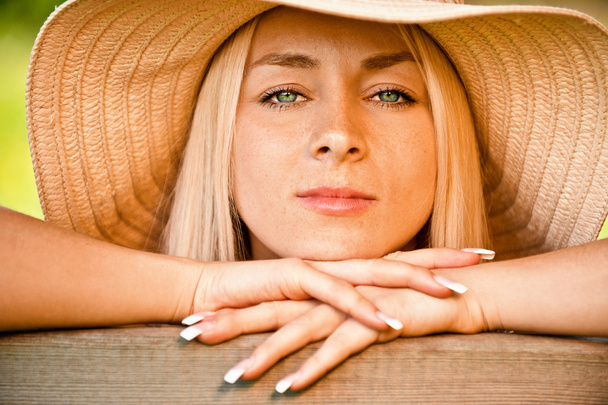 Young woman in straw hat - Photo, Image