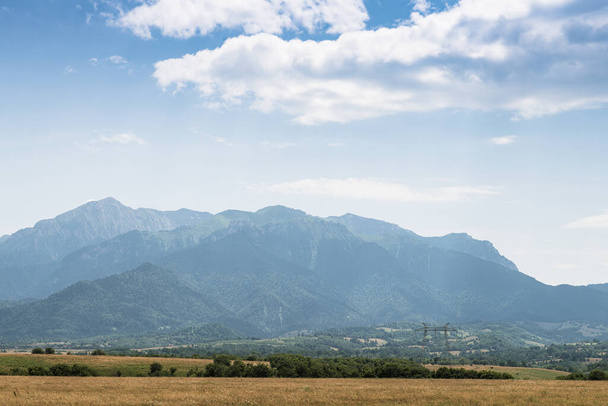 Meadow with mountains on background - Zdjęcie, obraz
