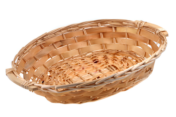 Wicker basket and braided wood close-up on a white background  - Photo, Image