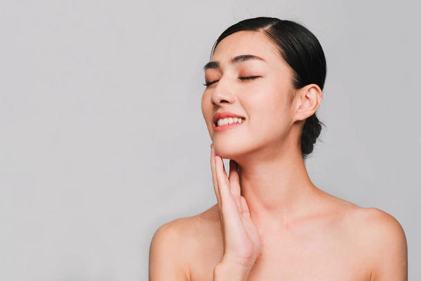 Face of Young beautiful asian woman with clean, fresh and bright skin, Happiness and cheerful with positive emotional,isolated on gray background,Beauty Cosmetics and Facial treatment Concept - Foto, afbeelding