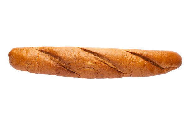 Vers brood geïsoleerd op witte achtergrond. Een stokbrood. Brood van bovenaf bekeken - Foto, afbeelding