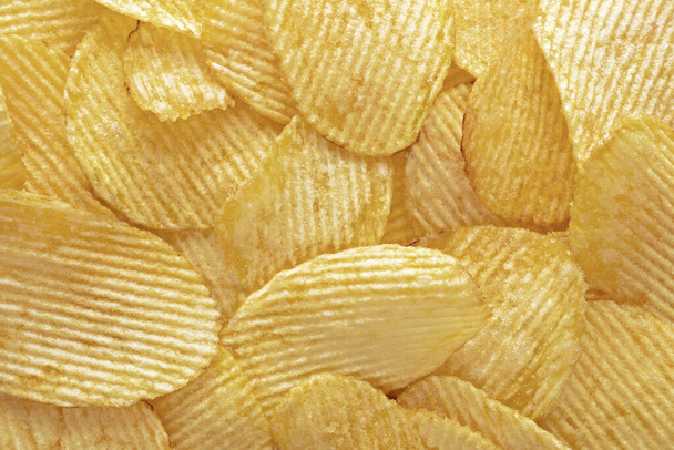 Image of sliced potato chips. Bunch of crisps. Closeup. Background.  - Foto, Bild