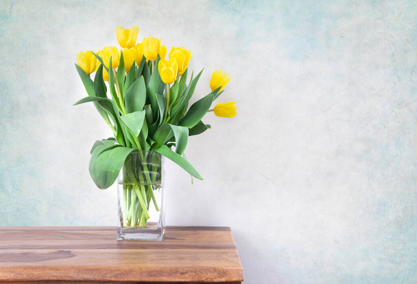 yellow tulips bouquet in vase - Fotoğraf, Görsel