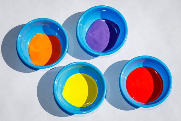 Coloured paints prepared for pinter with white background - Foto, immagini