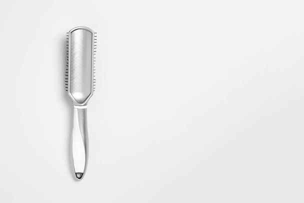 Hairbrush isolated on white background. High-resolution photo.Top view. - 写真・画像
