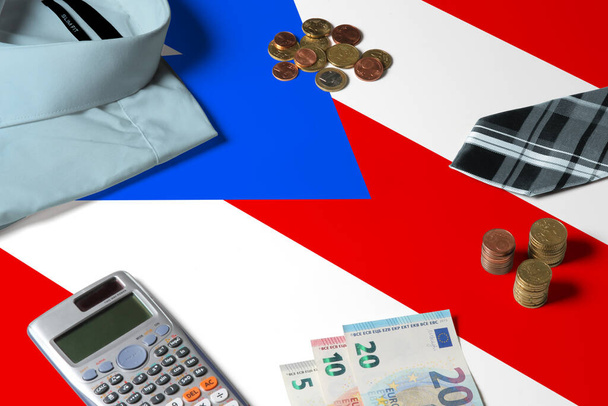 Puerto Rico flag on minimal money concept table. Coins and financial objects on flag surface. National economy theme. - Fotografie, Obrázek