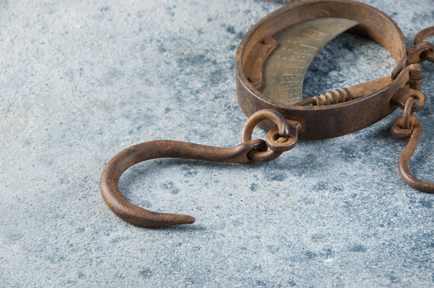 Antique brass iron rusty hand scales with hooks  on concrete background. Copy space for text. - Fotografie, Obrázek