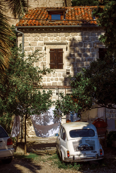 Old Building on street old town  Dobrota Montenegro trip  travel summer spring  - Photo, image