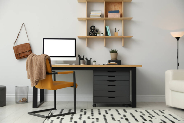 Stylish room interior with modern comfortable workplace - Photo, image