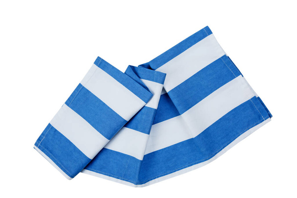 Striped blue folded kitchen towel cloth top view isolated on white. - Zdjęcie, obraz
