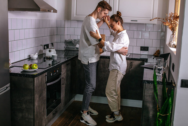 beautiful married couple dancing at home - Photo, Image