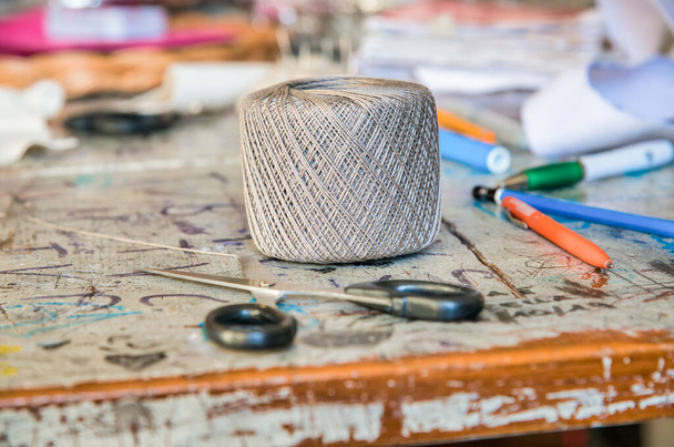 Grey color ball of threads wool in a sewing laboratory - 写真・画像