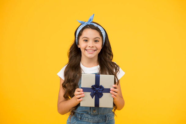 Surprise and present box. Child smiling happy hold gift box. Kid girl delighted gift. Childrens day. This is for you. Celebrate birthday. Kid birthday gift. Extra bonus. Grateful for good gift - 写真・画像