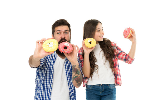 Sugar and dough for your life to be fun. Happy family have fun with donuts. Fun snack. Funny glazed dessert. Bake shop. Bakery and cafe. Holiday celebration. Fun and play - Φωτογραφία, εικόνα