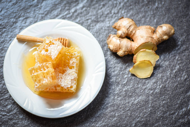 Honey ginger on plate background  - Photo, Image