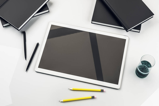 Digital tablet with cup of coffee on white desk, mockup. 3D Rendering - Fotografie, Obrázek