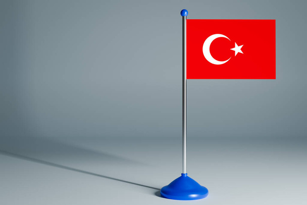 De 3D-weergave realistische nationale vlag van Turkije op stalen paal op grijs geïsoleerde achtergrond. Blanco tafelvlag, geschikt voor design, mocku - Foto, afbeelding