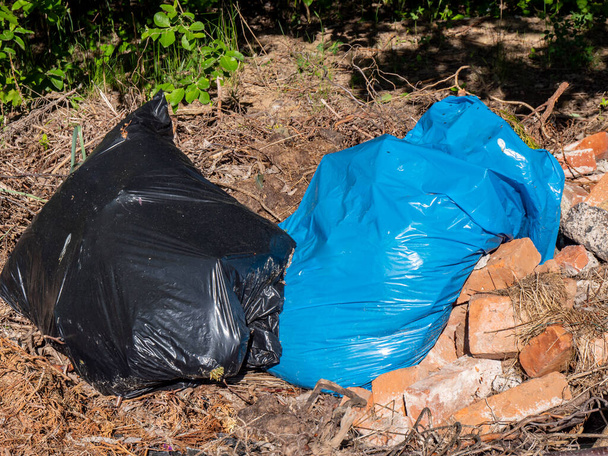 illegal dump dumped garbage bags - Photo, Image