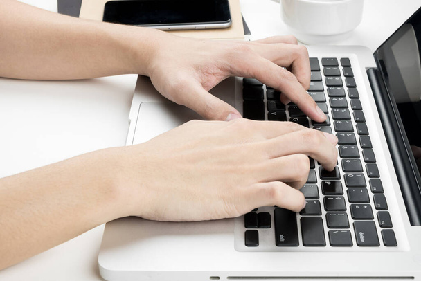 hands are typing on laptop computer keyboard  - Φωτογραφία, εικόνα