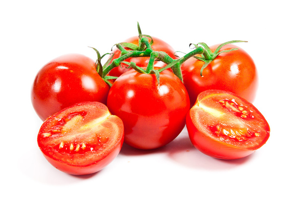 Closeup of tomatoes on the vine - Valokuva, kuva