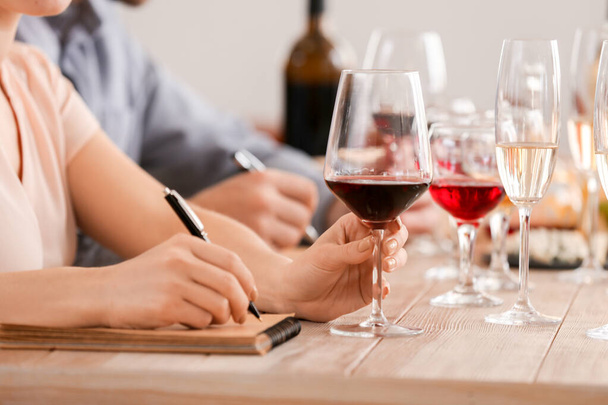 People tasting wine at the restaurant - Photo, Image