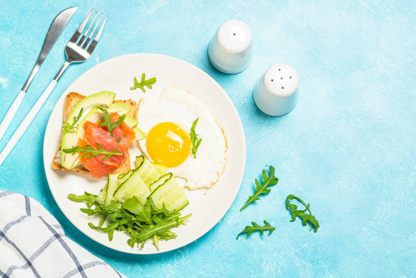 Healthy breakfast with egg, toast and salad. - Photo, Image