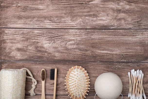 Top above overhead view photo of eco-friendly bath products isolated on wooden background with copy space - 写真・画像