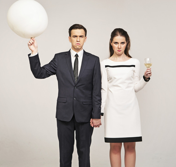 Grumpy couple before new year's eve party - 写真・画像