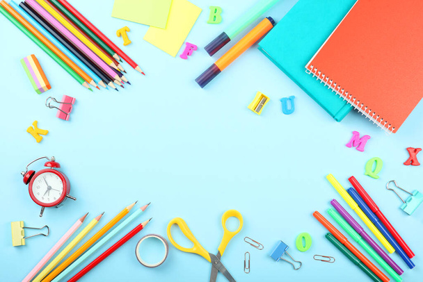 School office on a colored background top view. Office office, student office. Concept back to school. place for text. Flatlay - Photo, Image