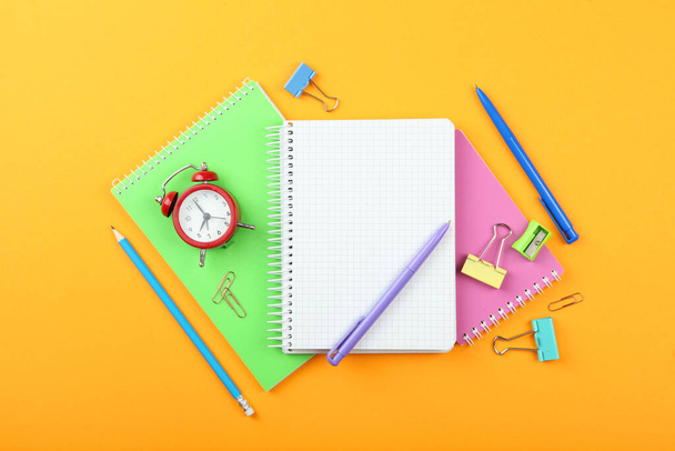 School office on a colored background top view. Office office, student office. Concept back to school. place for text. Flatlay - Photo, Image