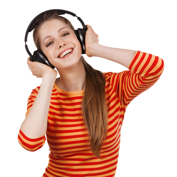 Cheerful girl with headphones listening to music - Foto, afbeelding