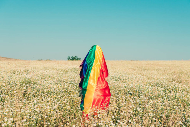 woman covered with lgbt flag - Photo, Image