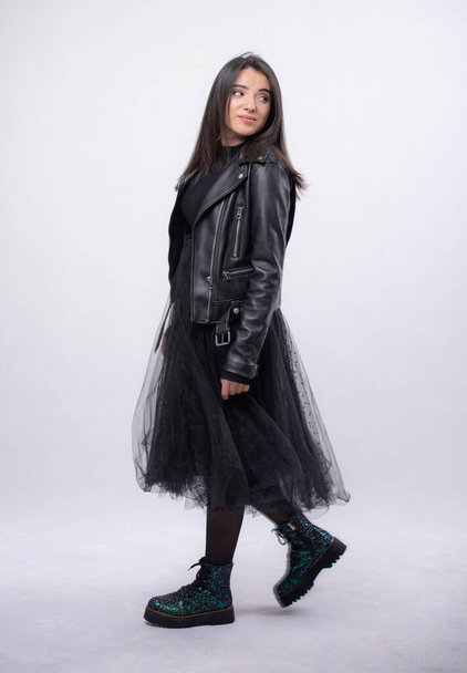 Happy beautiful woman in blue dress posing in studio isolated on white background,black long boots on his feet, Full length portrait,put on a black jacket - Foto, afbeelding