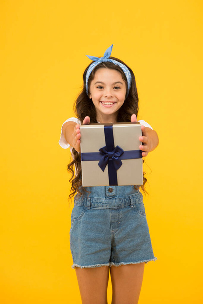 Happiness of giving. Celebrate birthday. Kid birthday gift. Extra bonus. Grateful for good gift. Surprise and present box. Child happy hold gift box. Kid girl delighted gift. Unexpected surprise - Фото, изображение