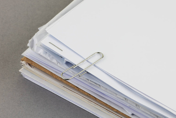 Bundle of work papers with paper clip - Foto, afbeelding