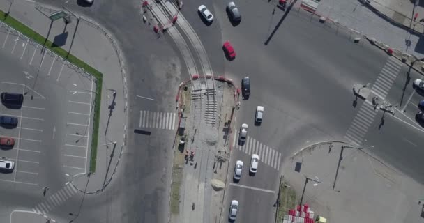 Реконструкция дороги с перекрестком трамвайных рельсов, строительная площадка
 - Кадры, видео