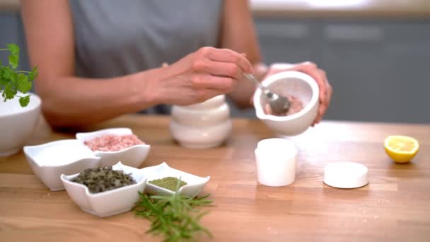 Adult woman preparing natural cosmetics at home - Footage, Video