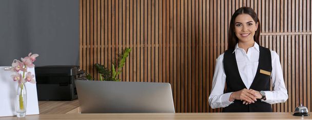 Portrait of receptionist at desk in lobby. Banner design - Photo, Image