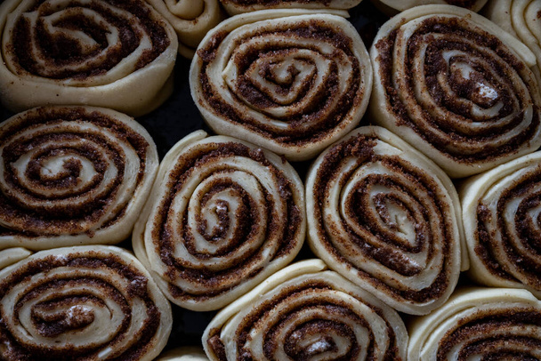 Looking Down on Rising Cinnamon Rolls in cast iron skillet - Photo, Image